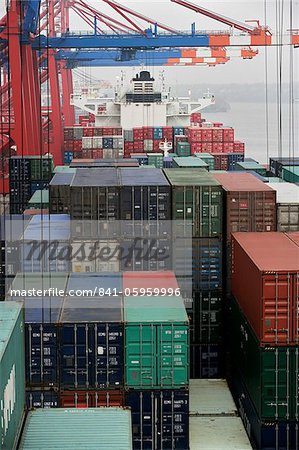 Container ship at container terminal, port of Hamburg, Germany, Europe