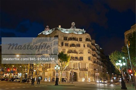 Casa Mila (La Pedrera), by Antoni Gaudi at dusk, Passeig de Gracia, Barcelona, Catalonia, Spain, Europe