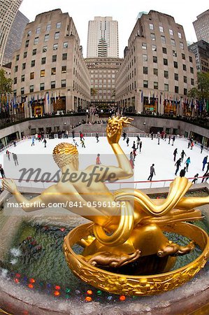 Ice skating rink below the Rockefeller Centre building on Fifth Avenue, New York City, New York, United States of America, North America