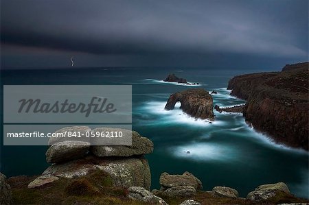 A fierce storm approaches the headland at Land's End, Cornwall, England, United Kingdom, Europe