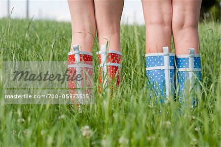 Close-Up of Girls Wearing Rubber Boots