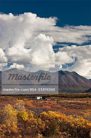 Hunters in a motorhome park and camp next to the Denali Highway during hunting season, Interior Alaska, Autumn