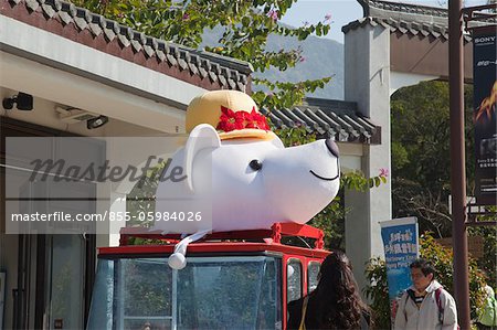 A mascot displayed in front of a shop at Ngon Ping 360, Lantau Island, Hong Kong