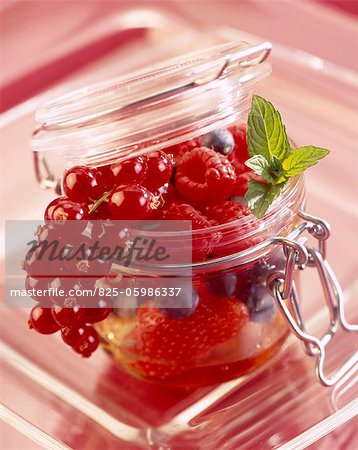summer fruit in glass jar