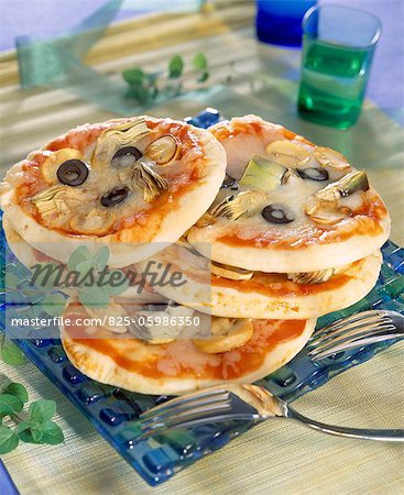 mushroom, artichoke and cheese pizzas