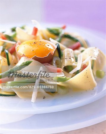 pasta with vegetables and raw egg