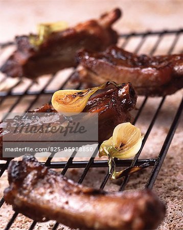 Marinated and grilled pork spare ribs on rack