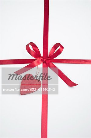 Gift decorated with ribbon and heart