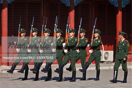 Chinese soldiers on drill duty in the parade area located next to Meridian Gate in the Forbidden City, Beijing, China.