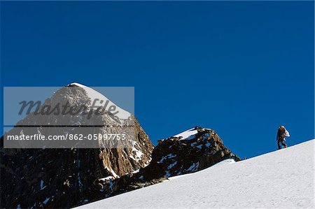 Europe, France, The Alps, Mont Blanc, Aiguille de Bionnassay, hiker on the route to Mont Blanc
