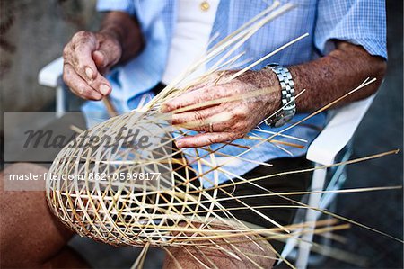 Italy, Puglia, Lecce district, Salentine Peninsula, Salento, Gallipoli.Artisan at work in the old part of the town