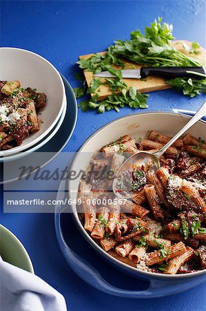 Pot of meat rigatoni with herbs
