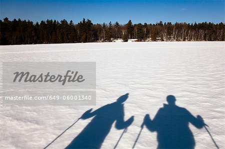 Cross country skiers on snowy field