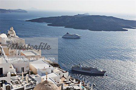 Aerial view of cruise ships on coast