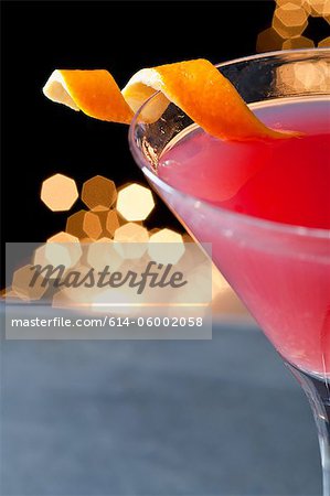 Cosmopolitan cocktail with twist of orange peel