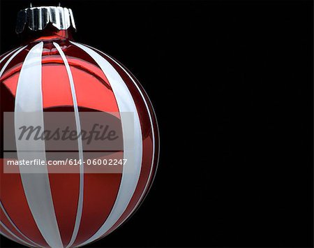 Red and white Christmas bauble, studio shot