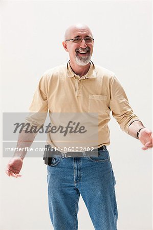 Mature man smiling, studio shot