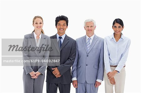 Multicultural business team against white background