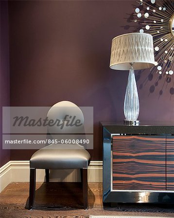 Contemporary chair and sideboard in Addison Road residence, UK