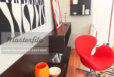 Red Chair And Shelves In Contemporary Room