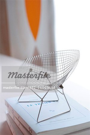 Small Model Of Chair On Books