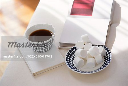 Tea And Cylindrical Sugar Cubes On Table