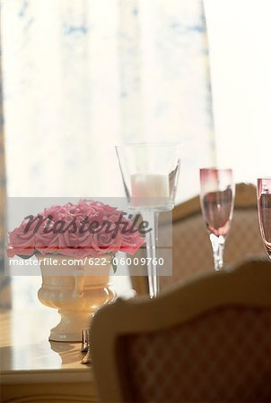 Pink Roses In Vase On Dining Table