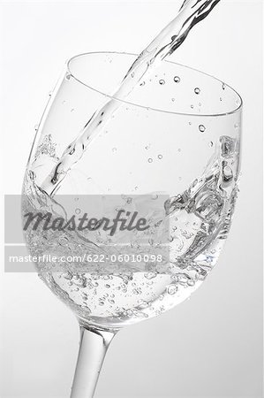 Water Pouring Into Glass Water Pouring Into Glass