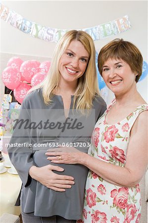 Pregnant Woman with Mother at a Baby Shower