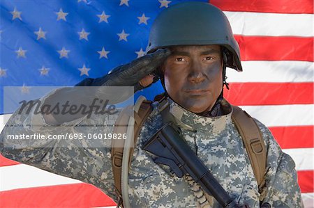 Portrait of US Army soldier saluting