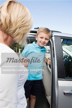 Mother Driving Son to School