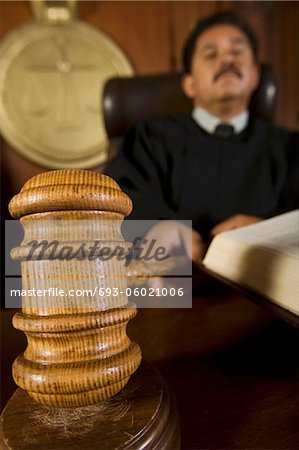 Judge using gavel in court