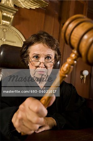 Judge using gavel in court