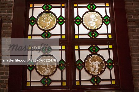 Stained glass window of an old cantonese villa exhibited at Liwan Museum, Xiguan, Guangzhou, China