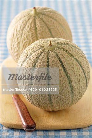 Cantaloupes on Cutting Board