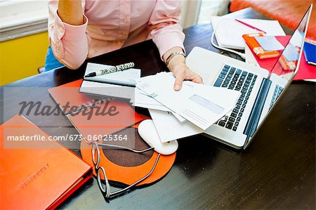 Woman paying bills