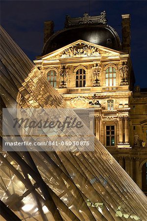 Louvre reflections in glass pyramid at twilight, Rue de Rivoli, Paris, France, Europe