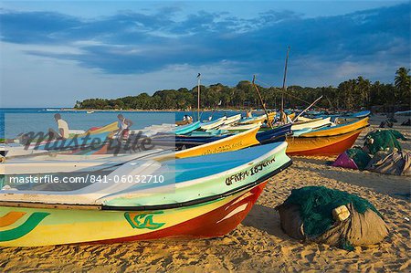 Newer post 2004 tsunami foreign-donated fishing boats on this popular surf beach, Arugam Bay, Eastern Province, Sri Lanka, Asia