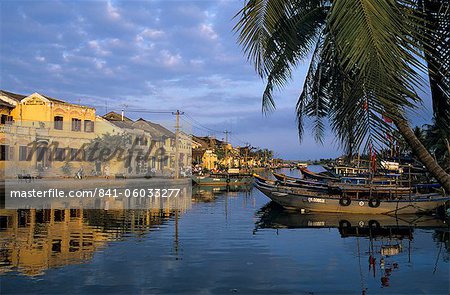 View of old town and fishing boats along Thu Bon River, Hoi An, UNESCO World Heritage Site, South Central Coast, Vietnam, Indochina, Southeast Asia, Asia