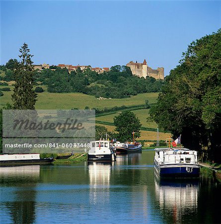 View along the Burgundy Canal to the Chateau, Chateauneuf, Burgundy, France, Europe