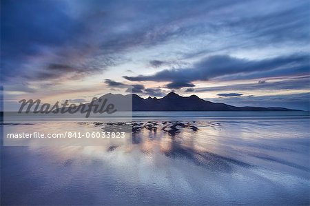 Dusk, looking to towards Rum from the Bay of Laig on Eigg, Inner Hebrides, Scotland, United Kingdom, Europe