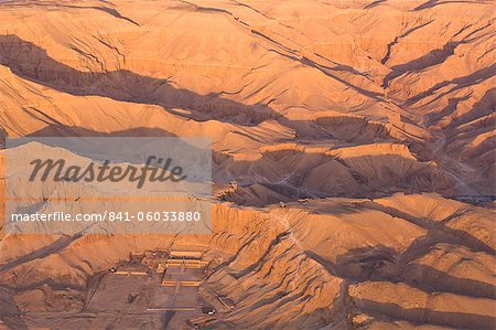 Aerial view from hot air balloon of Hatshepsut's Mortuary Temple at Deir el-Bahri, and the Valley of the Kings at sunrise, Thebes, UNESCO World Heritage Site, Egypt, North Africa, Africa