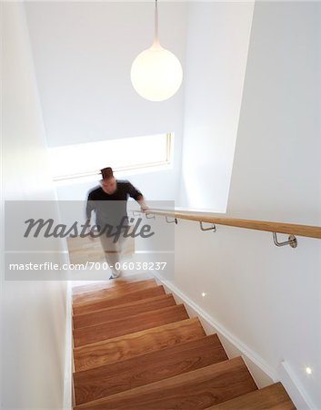 Man Walking Up Stairs