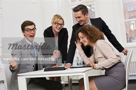 Business people playing board games