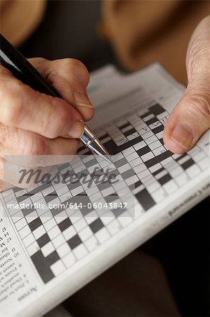 Senior woman doing crossword