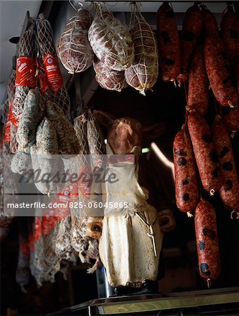 Cooked pork meats hanging