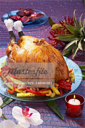 Roast capon with pineapple and cashews