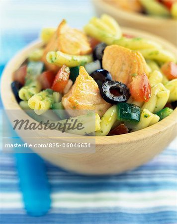 Pasta,salmon and vegetables with pesto sauce