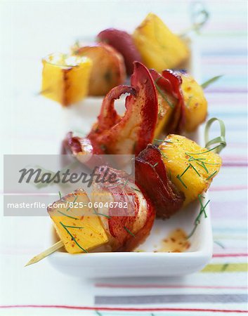 Lobster,duck magret and pineapple skewers