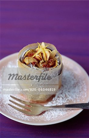 Roast fig with almonds wrapped in thin pastry